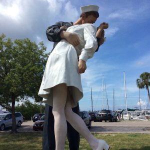 Kissing sailor